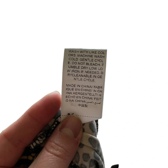 Shein • SXY Leopard Print Twist Detail Skirt - Picture 6 of 8